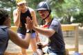 camper, male camper, horse, high five, smiles, Summer, June 15, 2022