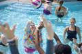 ***camper, one, girl, shootin hoops, in the pool, camper, volunteer, two, girls, having a blast by the pool, sunny, Summer, June 8, 2022